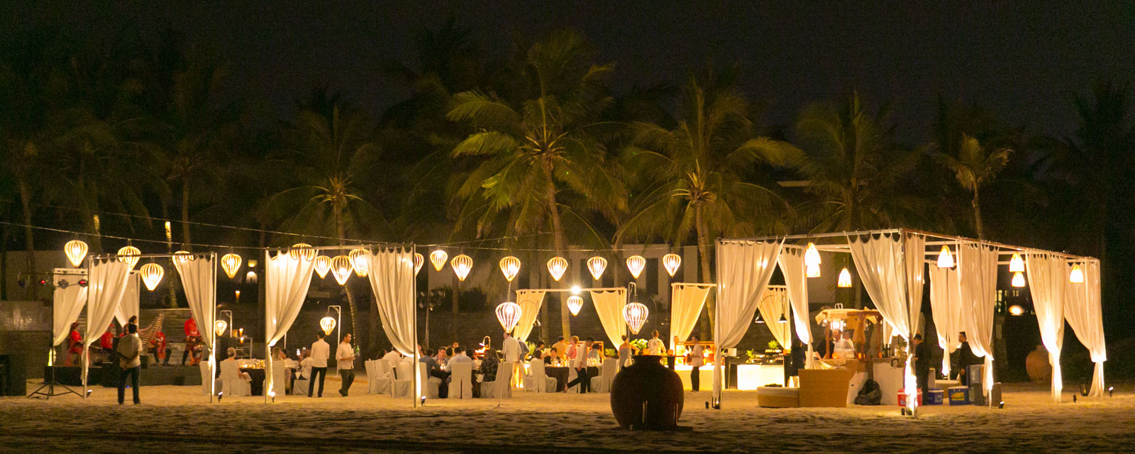 Luxury Incentive Travel in Vietnam. beach dinner set up by Realm Events in Da Nang and Hoi An, Vietnam.